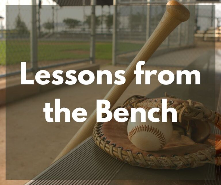 baseball bat, glove, and ball on the bench.